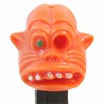 PEZ - One-Eyed Monster  Orange Head, Green Eye