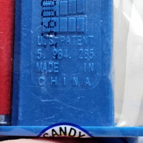 PEZ - Toy Story - Toy Story 2 - Woody - spot under sheriff star - A