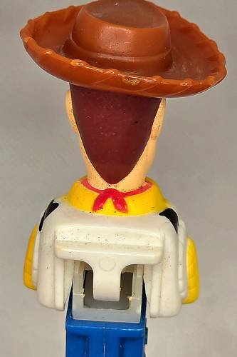 PEZ - Toy Story - Toy Story 2 - Woody - spot under sheriff star - A