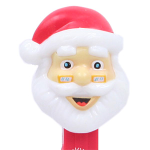 PEZ - Christmas - Santa Claus - Tan head, red hat - E