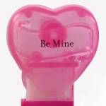 PEZ - Be Mine  Nonitalic Black on Cloudy Crystal Pink (c) 2008 on White hearts on short hot pink